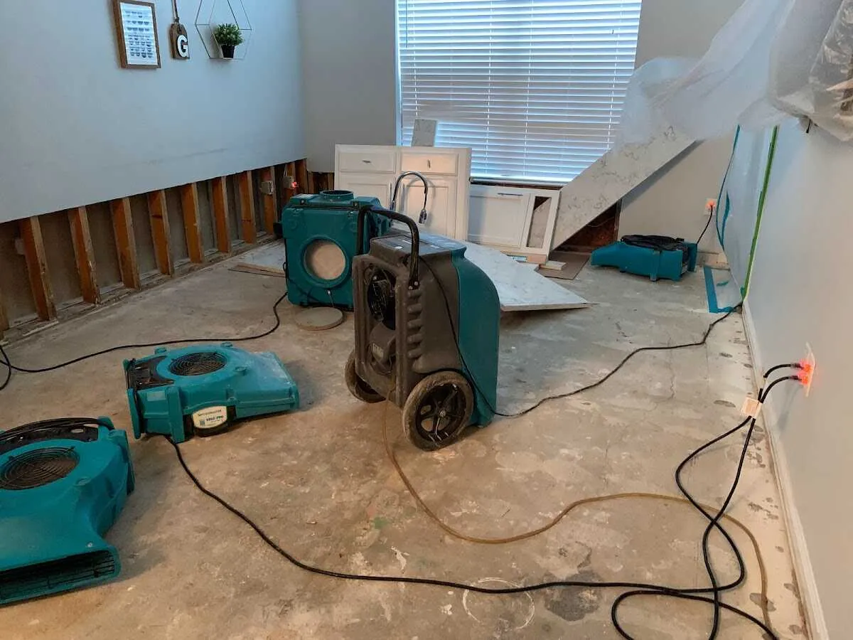 Dehumidifier in flood-cut room for Water Damage Restoration in Chelsea